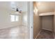 Bedroom with carpet and ceiling fan and access to a closet at 15955 N Cristine Ln, Surprise, AZ 85388