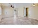 Open floor plan with tile flooring leading to kitchen, backyard and bedrooms at 15955 N Cristine Ln, Surprise, AZ 85388