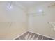 Organized walk-in closet with multiple shelves for ample storage space and carpet at 15955 N Cristine Ln, Surprise, AZ 85388
