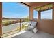 Cozy balcony seating with desert views at 16364 E Ridgeline Dr, Fountain Hills, AZ 85268