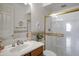 Bathroom featuring a glass shower with gold trim and a single vanity at 16364 E Ridgeline Dr, Fountain Hills, AZ 85268