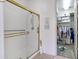 Bathroom featuring a glass shower with a gold frame and an adjoining walk-in closet at 16364 E Ridgeline Dr, Fountain Hills, AZ 85268