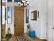 Light-filled foyer with tile floors, stylish decor, and elegant lighting fixtures at 16364 E Ridgeline Dr, Fountain Hills, AZ 85268