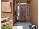 Charming front entrance with desert decor, a stylish door, and stucco exterior at 16364 E Ridgeline Dr, Fountain Hills, AZ 85268