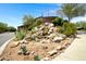 Lush landscaped water feature at property entrance at 16364 E Ridgeline Dr, Fountain Hills, AZ 85268