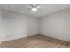 Well-lit empty bedroom offering vinyl wood flooring and a minimalist design at 16852 E La Montana Dr # C18, Fountain Hills, AZ 85268