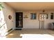 Inviting entrance with a secure black metal door and a cream brick wall that gives a welcoming feel at 16852 E La Montana Dr # C18, Fountain Hills, AZ 85268