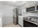 Bright kitchen featuring stainless steel appliances, a range, and ample counter space at 16852 E La Montana Dr # C18, Fountain Hills, AZ 85268