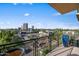 Balcony with city views, decorative flower pots, and wrought iron railing at 17 W Vernon Ave # 508, Phoenix, AZ 85003