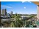 Balcony with great views of the city, potted plants, and wrought iron railing at 17 W Vernon Ave # 508, Phoenix, AZ 85003