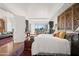 Bright bedroom leads to living area with city views and hardwood flooring at 17 W Vernon Ave # 508, Phoenix, AZ 85003