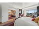 Spacious bedroom with sitting area, city views, and hardwood flooring at 17 W Vernon Ave # 508, Phoenix, AZ 85003
