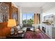 Comfortable living room with large windows, oriental rug, and city views at 17 W Vernon Ave # 508, Phoenix, AZ 85003