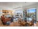 Bright living room featuring dining area, city views, and tiled floors at 17 W Vernon Ave # 508, Phoenix, AZ 85003