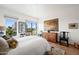 Inviting main bedroom featuring city views, wooden accents, and comfortable furnishings at 17 W Vernon Ave # 508, Phoenix, AZ 85003