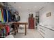 Spacious walk-in closet featuring custom shelving and drawers for organized storage at 17 W Vernon Ave # 508, Phoenix, AZ 85003
