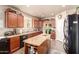 Well-appointed kitchen with granite countertops, stainless steel appliances, and ample cabinet space at 17153 W Gambit Trl, Surprise, AZ 85387