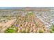 Extensive aerial shot of the neighborhood with community pool, mature landscaping, and the mountains in the distance at 17606 N 17Th Pl # 1096, Phoenix, AZ 85022