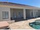 Rear covered patio overlooking the pool and spa at 18029 W San Miguel Ave, Litchfield Park, AZ 85340