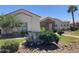 Charming single-story home featuring stone accents and well-maintained desert landscaping at 18029 W San Miguel Ave, Litchfield Park, AZ 85340