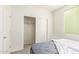 Bright bedroom has a carpet and a closet with sliding doors at 18637 W Williams Rd, Surprise, AZ 85387