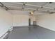 Spacious garage boasts a clean interior, ample storage space, and a convenient water heater for added functionality at 2110 W Navarro Ave, Mesa, AZ 85202