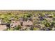 Stunning aerial view showcasing the home, backyard oasis, and lush desert landscaping at 22204 N 55Th St, Phoenix, AZ 85054