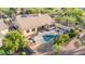 View of outdoor entertainment with a private pool, fire pit, and built-in barbeque at 22204 N 55Th St, Phoenix, AZ 85054