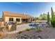 Expansive backyard with custom pool, outdoor grill, fire pit, mature desert landscaping and privacy at 22204 N 55Th St, Phoenix, AZ 85054