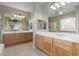 Spacious bathroom with dual sink vanities and a large mirror, offering plenty of counter space at 22204 N 55Th St, Phoenix, AZ 85054