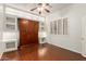 Bedroom features a built in Murphy bed, recessed lighting, and shuttered window at 22204 N 55Th St, Phoenix, AZ 85054
