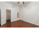 Bedroom with hardwood floors, walk in closet, and recessed lighting at 22204 N 55Th St, Phoenix, AZ 85054
