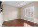 Clean bedroom with shuttered window and a ceiling fan that provides comfort and natural light at 22204 N 55Th St, Phoenix, AZ 85054