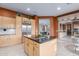 Spacious kitchen with a large island, stainless appliances, and ample cabinet space at 22204 N 55Th St, Phoenix, AZ 85054