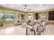 Open living space with stylish furnishings, neutral tones, and large windows providing natural light at 22204 N 55Th St, Phoenix, AZ 85054