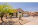 Inviting single-story home with desert landscaping and a well-manicured front yard at 22625 N Van Loo Dr, Maricopa, AZ 85138