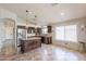 Gourmet kitchen with custom cabinetry, stainless steel appliances, and central island at 22625 N Van Loo Dr, Maricopa, AZ 85138
