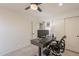 Office with dual monitors, a ceiling fan, and natural light at 22625 N Van Loo Dr, Maricopa, AZ 85138