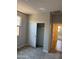 A clean bedroom featuring gray carpet and a closet at 22913 N 183Rd Dr, Surprise, AZ 85387