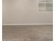 A bright, neutral living room featuring recessed lighting and tile floors at 22913 N 183Rd Dr, Surprise, AZ 85387