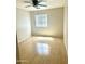 Bedroom with ceiling fan, laminate flooring, and a window at 23284 W Pima St, Buckeye, AZ 85326