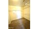 Spacious walk-in closet with ample shelving for organized storage solutions at 23284 W Pima St, Buckeye, AZ 85326