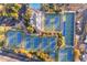 Overhead aerial view shows the tennis courts and neighborhood pool at 23753 S Vacation Way, Sun Lakes, AZ 85248