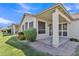 Charming back patio with mature plants and desert landscaping at 23753 S Vacation Way, Sun Lakes, AZ 85248