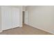 Bedroom featuring sliding door closet and tile flooring at 23753 S Vacation Way, Sun Lakes, AZ 85248