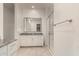 Well-lit bathroom features granite countertops and a glass shower at 24478 N 166Th Ave, Surprise, AZ 85387