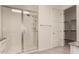 Bathroom shower with white subway tile and a glass door at 24478 N 166Th Ave, Surprise, AZ 85387
