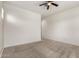 Empty bedroom featuring a ceiling fan and neutral tones at 24478 N 166Th Ave, Surprise, AZ 85387