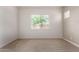 Comfortable bedroom with neutral walls and carpet, offering a serene atmosphere at 24478 N 166Th Ave, Surprise, AZ 85387
