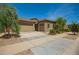 Inviting single-story home with a two car garage, desert landscaping and a cozy entrance at 24478 N 166Th Ave, Surprise, AZ 85387